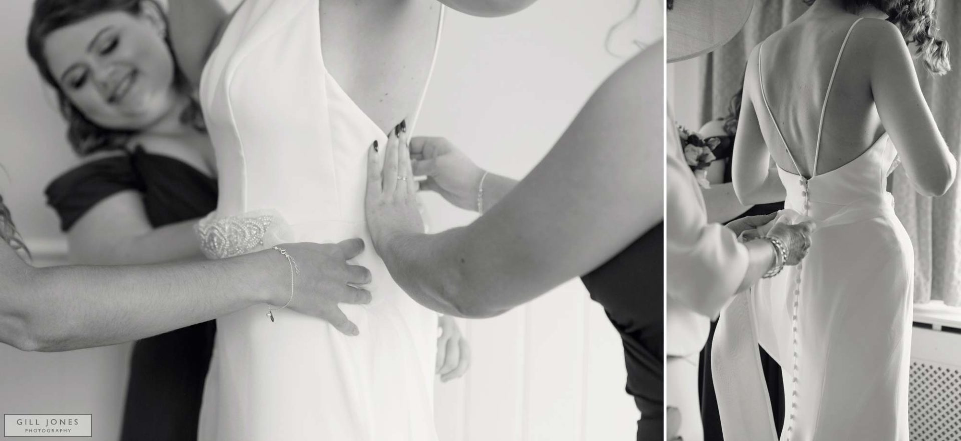 the brides mother is buttoning her daughters dress