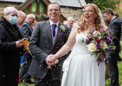 Confetti being thrown at bride and groom at Nant Peris, Llanberis