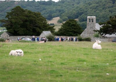 all the guests outside St. Mary's Church , Caerhun by Anglesey wedding photographer Gill Jones Photography