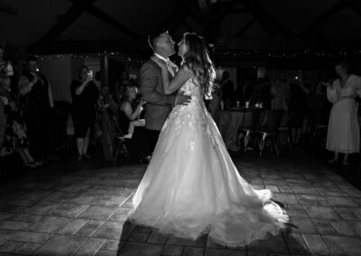 new husband and wife dancing their first dance by Anglesey wedding photographer, North Wales, Gill Jones Photography Gill Jones Photographer