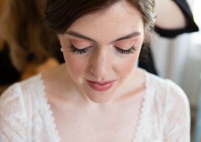 Close up of a brides eyes closed showing very long eye lashes by Anglesey wedding photographer Gill Jones